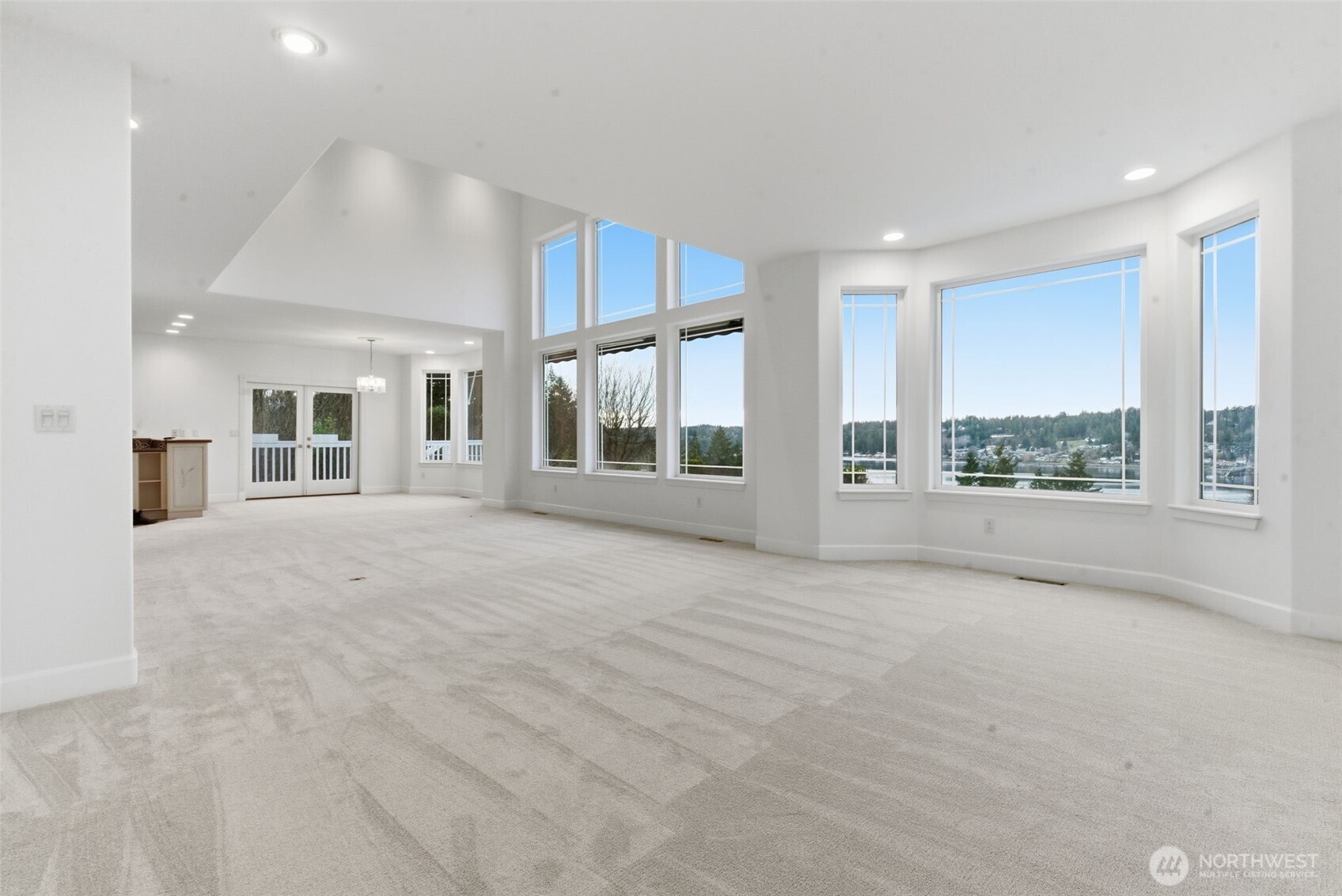 457 East Victor Road Belfair, WA 98528 - Photo 9 of 40 a view of an empty room with a window