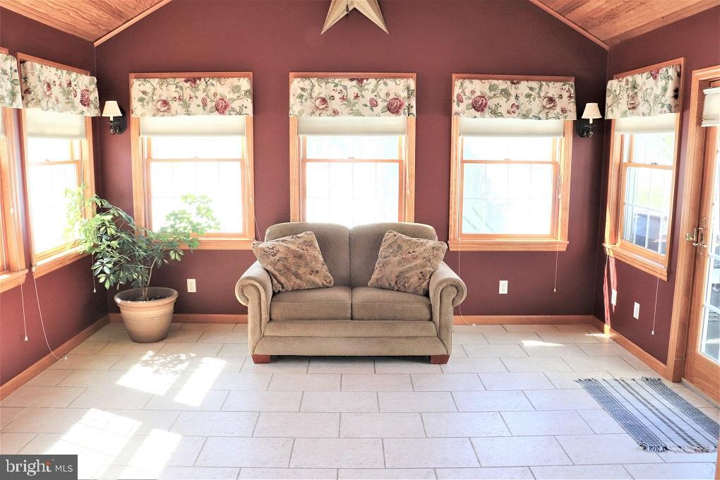 286 Mt Airy Road New Providence, PA 17560 - Photo 8 of 52 Window-Wrapped Sun Room