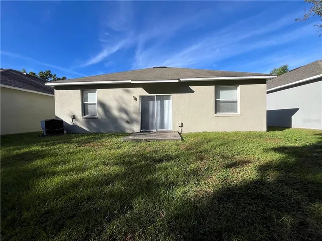 a front view of house with yard
