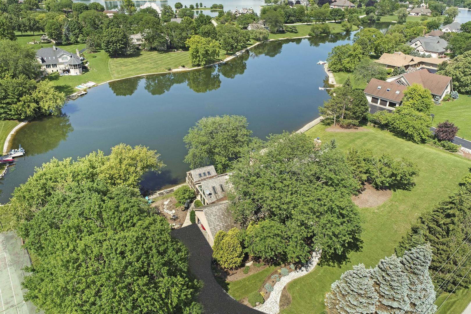 30 West Mundhank Road South Barrington, IL 60010 - Photo 1 of 45 an aerial view of a house with a lake view