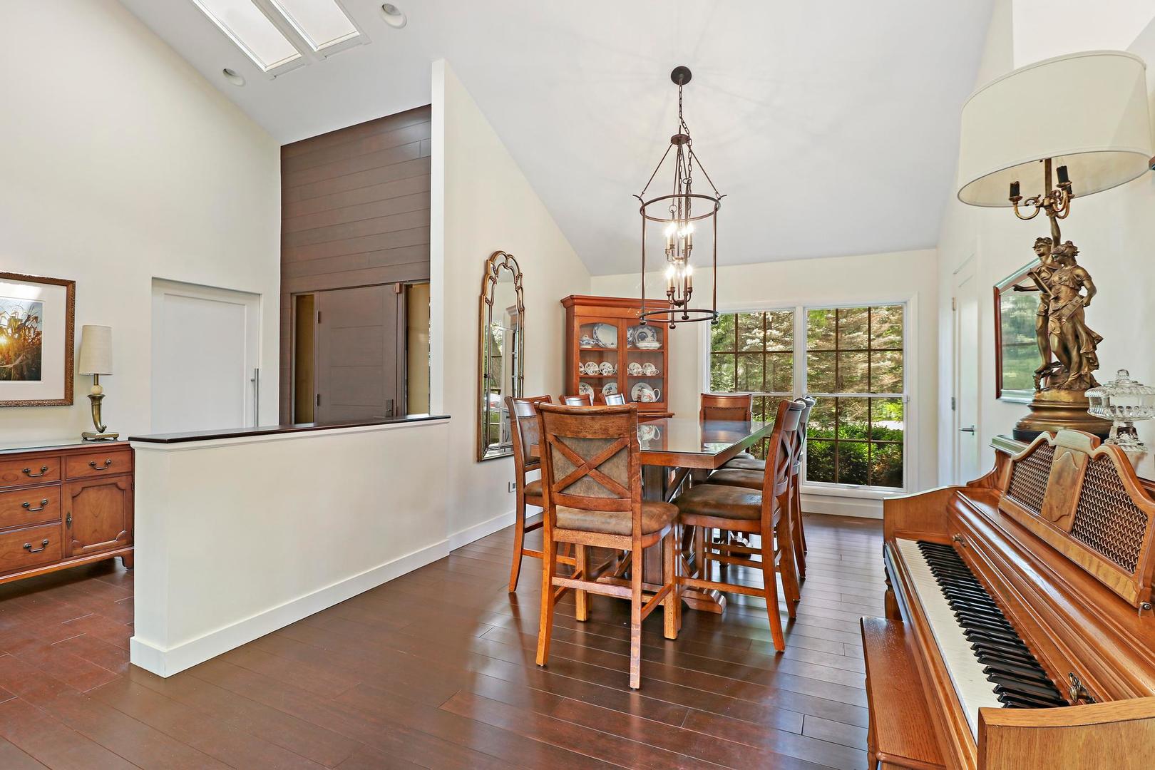 30 West Mundhank Road South Barrington, IL 60010 - Photo 15 of 45 a view of a dining room with furniture window and wooden floor
