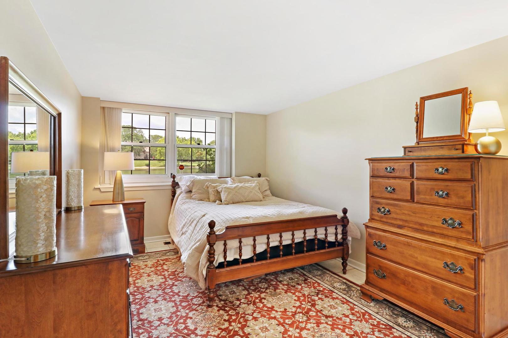 30 West Mundhank Road South Barrington, IL 60010 - Photo 41 of 45 a bed room with a bed and a dresser