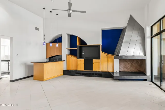 a view of staircase with white walls