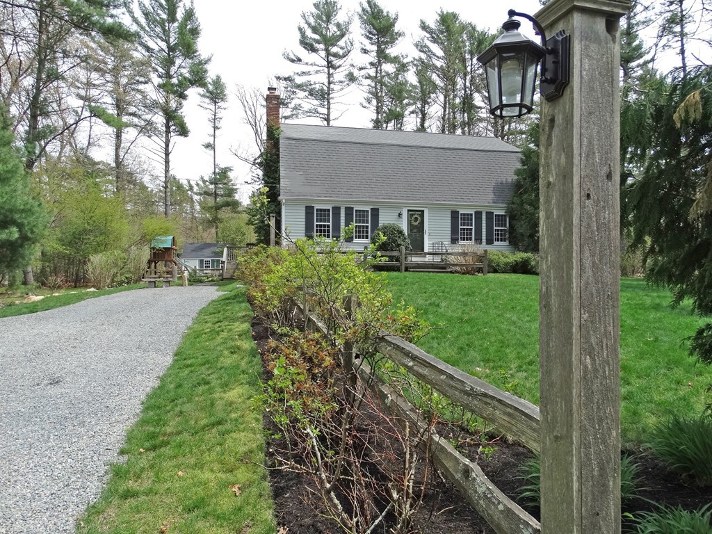 3 Bassett Street Rochester, MA 02770 - Photo 25 of 28 a view of a house with a yard