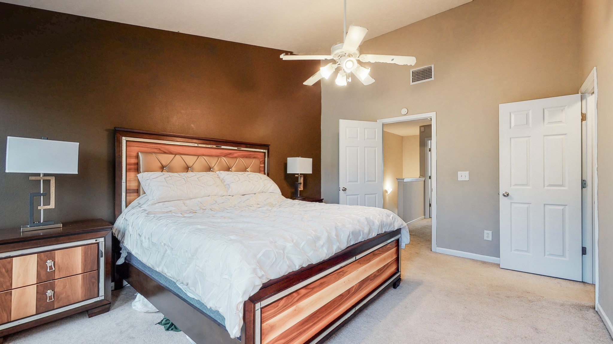 2004 Shaylin Loop Antioch, TN 37013 - Photo 12 of 25 a bed room with a bed and a lamp
