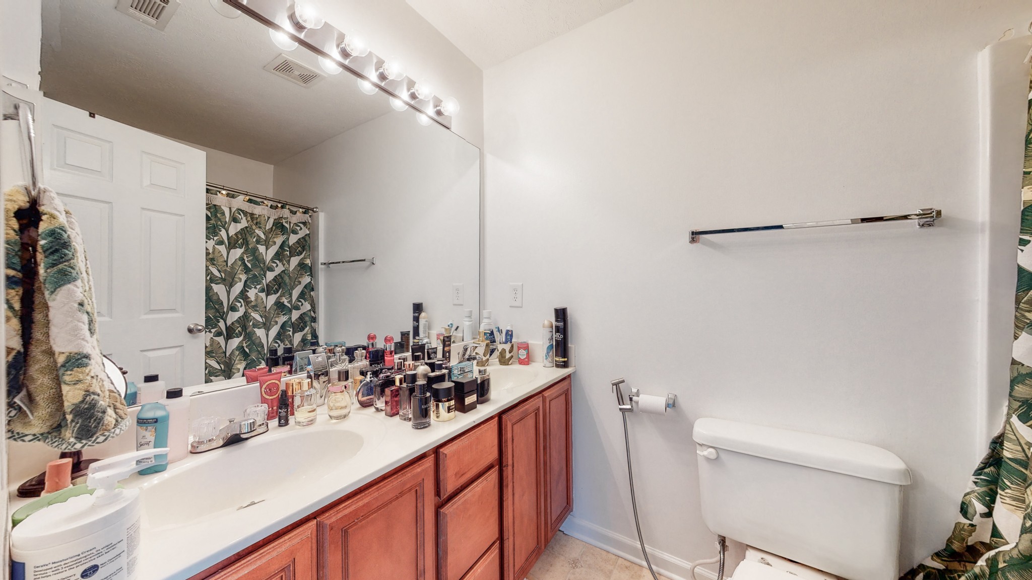 2004 Shaylin Loop Antioch, TN 37013 - Photo 14 of 25 a bathroom with a sink and a mirror