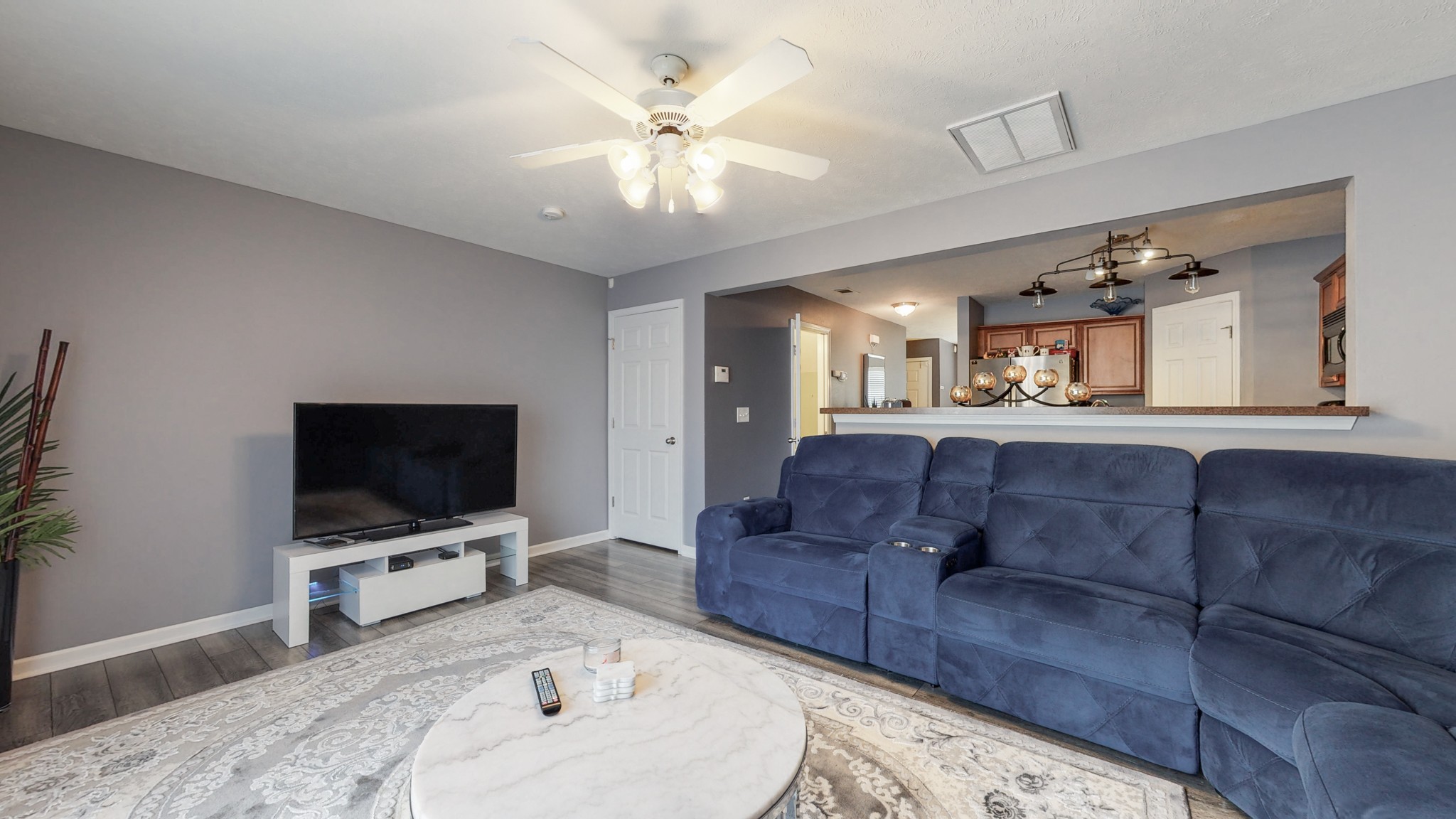 2004 Shaylin Loop Antioch, TN 37013 - Photo 2 of 25 a living room with furniture and a flat screen tv