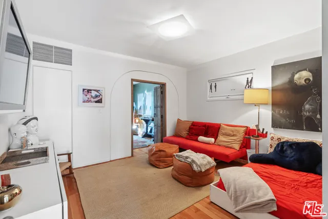 a living room with furniture and a couch