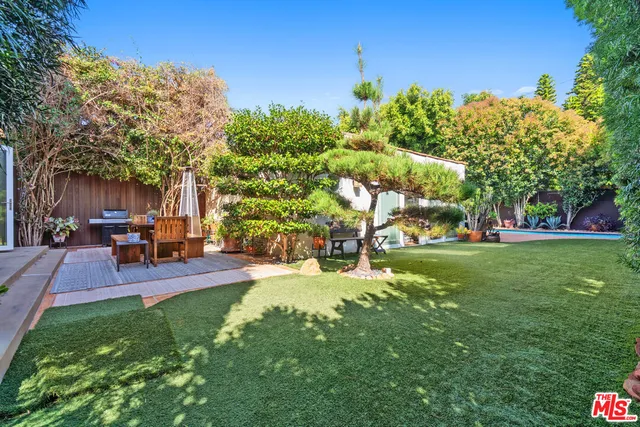 a view of outdoor space with swimming pool