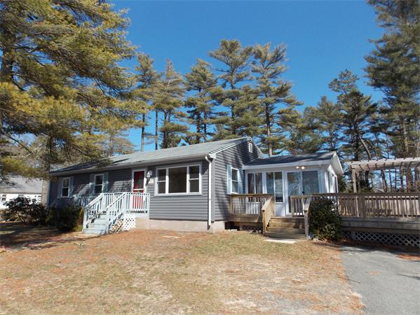 592 County Road Wareham, MA 02576 - Photo 16 of 16 a front view of a house with a porch and a garage