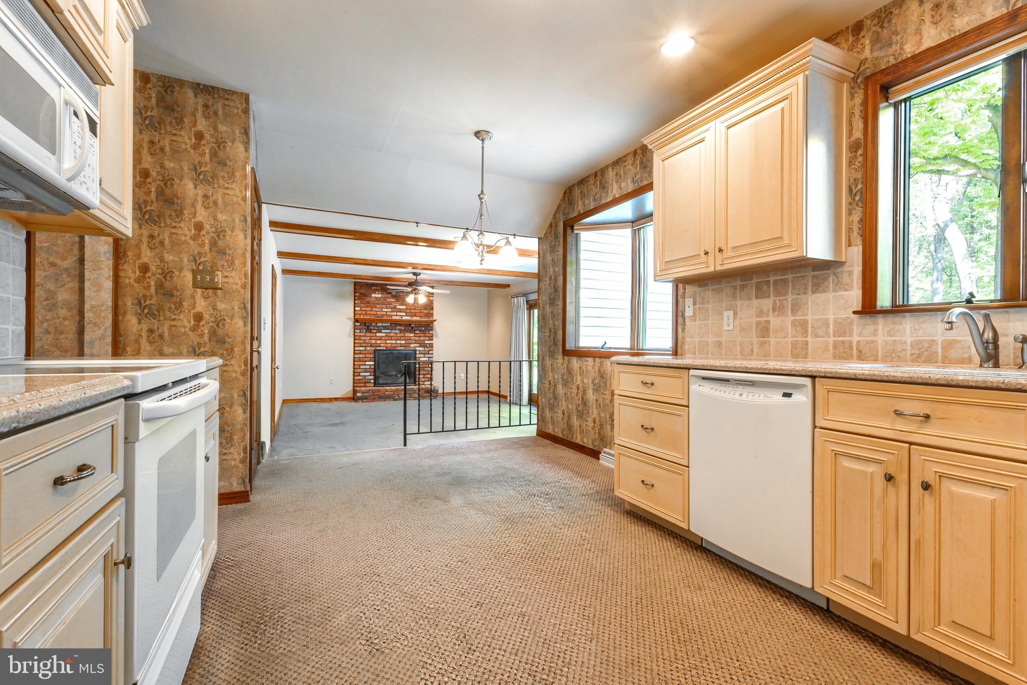24 Cedar Creek Drive Clementon, NJ 08021 - Photo 11 of 28 a kitchen with white cabinets and white appliances