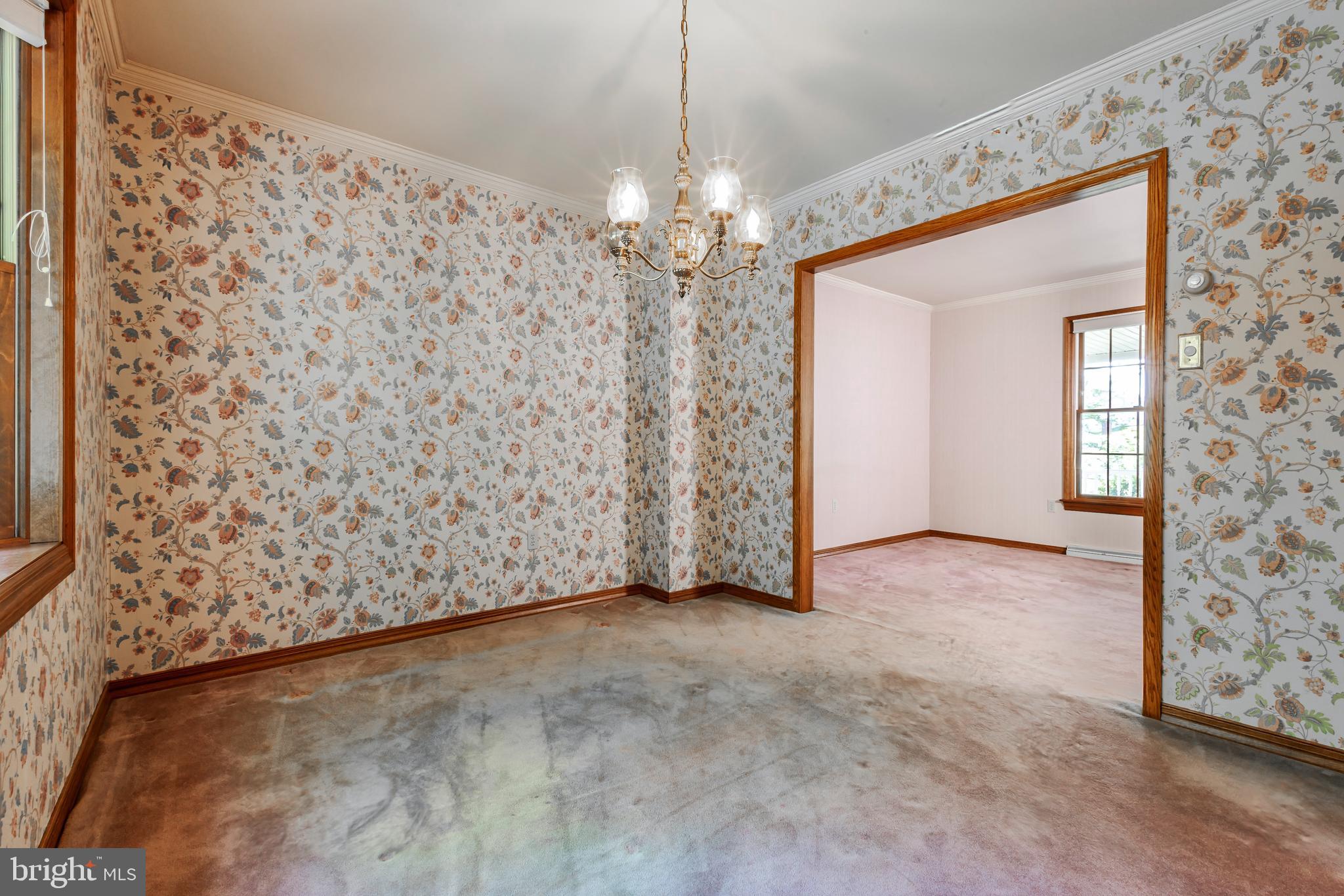 24 Cedar Creek Drive Clementon, NJ 08021 - Photo 12 of 28 a view of a chandelier in big room and chandelier fan