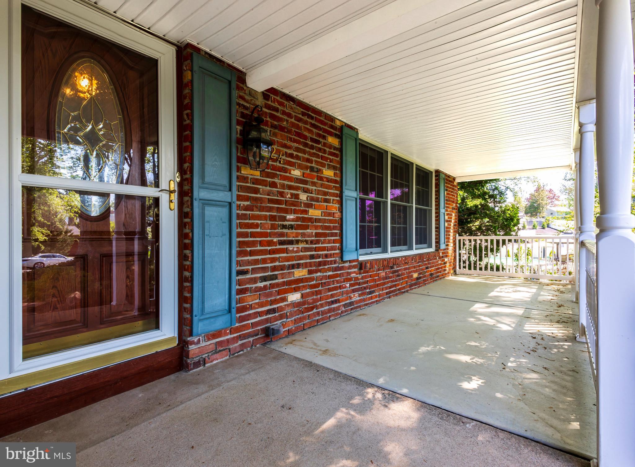 24 Cedar Creek Drive Clementon, NJ 08021 - Photo 27 of 28 a view of a brick house with a large window