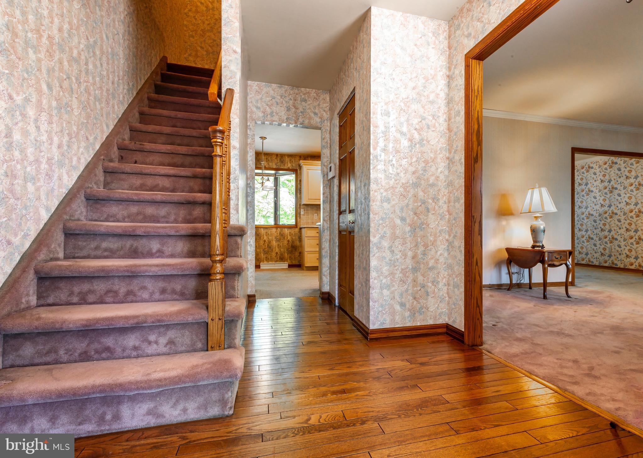 24 Cedar Creek Drive Clementon, NJ 08021 - Photo 4 of 28 a view of an entryway with wooden floor and a livingroom view