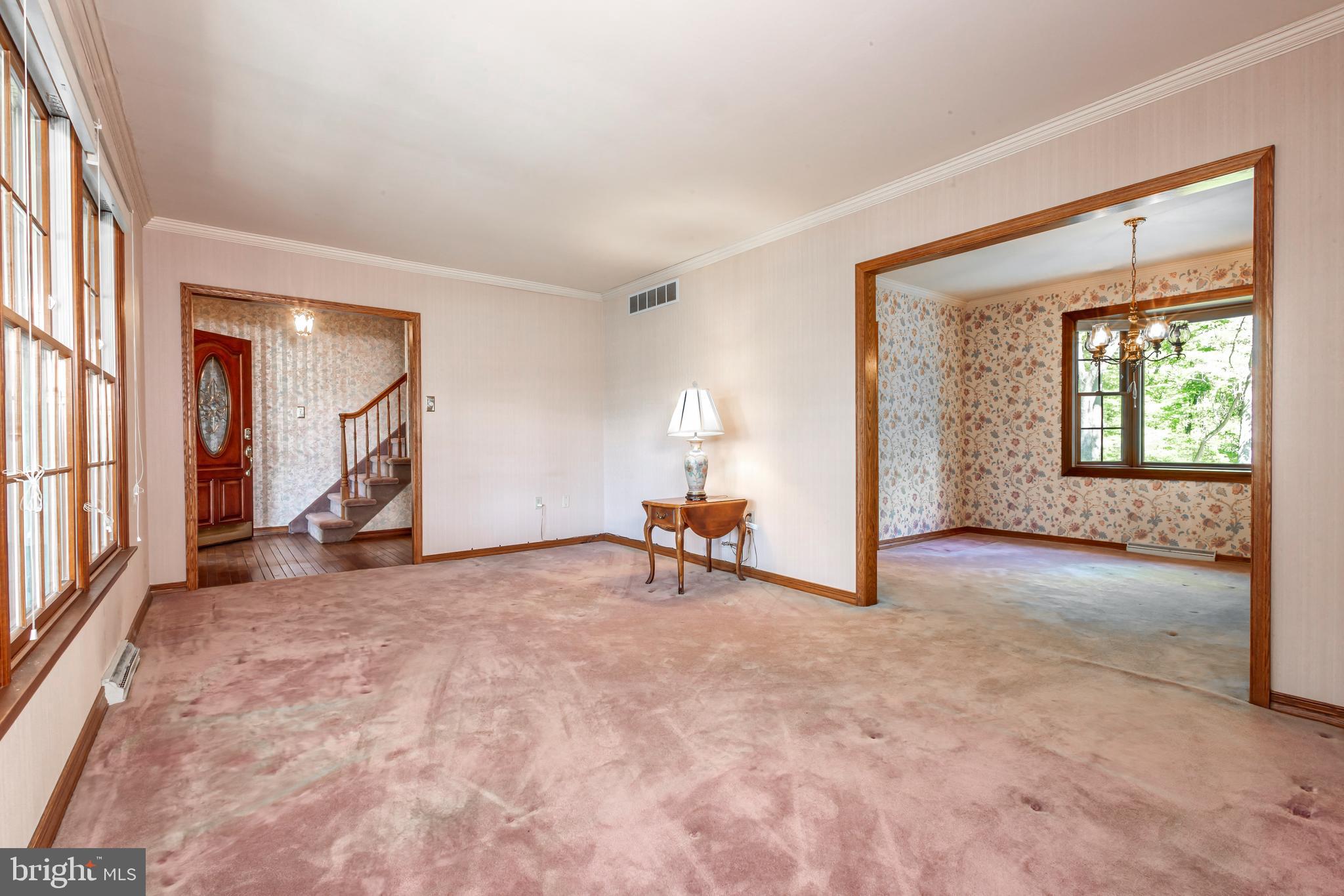 24 Cedar Creek Drive Clementon, NJ 08021 - Photo 7 of 28 a view of a room with gym equipment and a large window