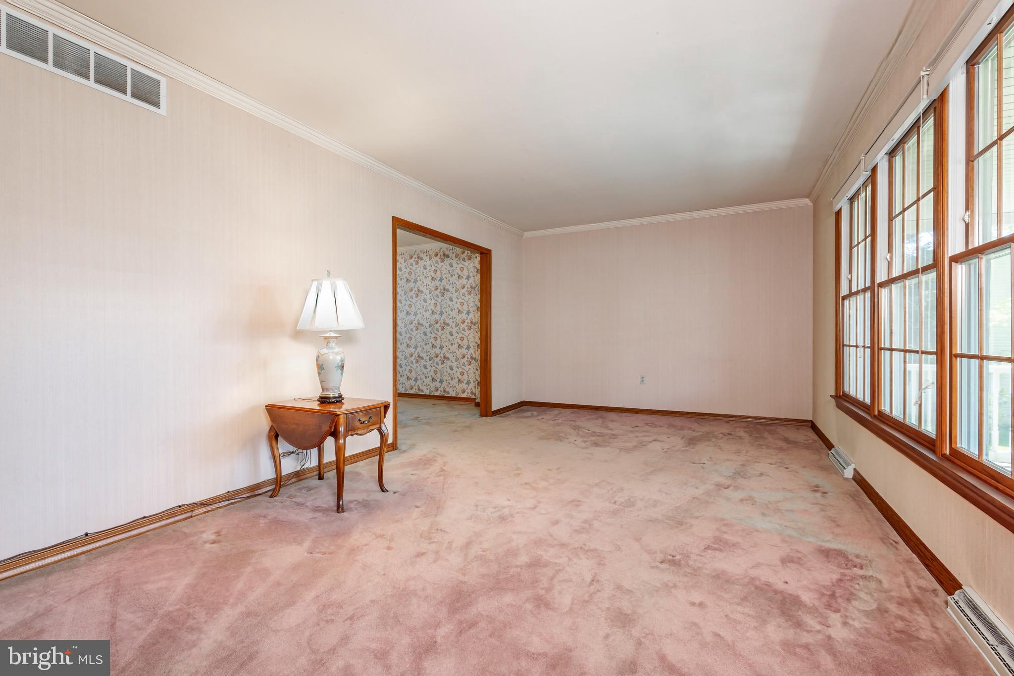 24 Cedar Creek Drive Clementon, NJ 08021 - Photo 8 of 28 a view of an empty room with window and wooden floor