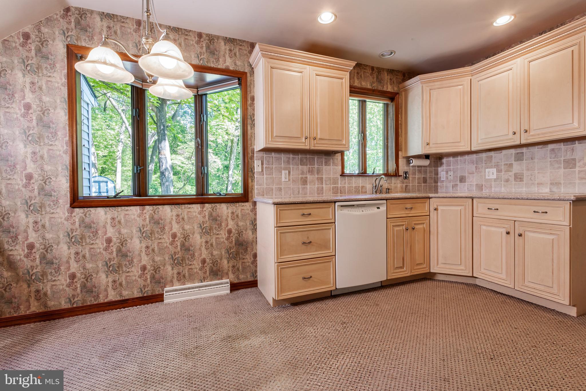 24 Cedar Creek Drive Clementon, NJ 08021 - Photo 9 of 28 a kitchen with white cabinets and window