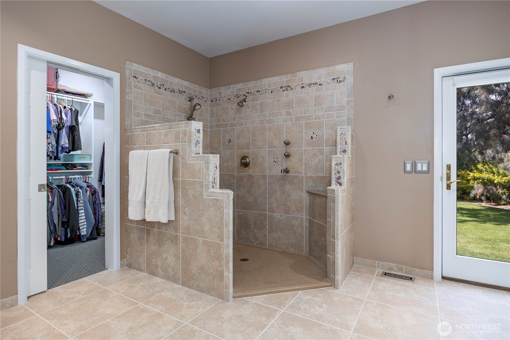 8620 Richardson Road Pasco, WA 99301 - Photo 22 of 40 a bathroom with a shower and a sink