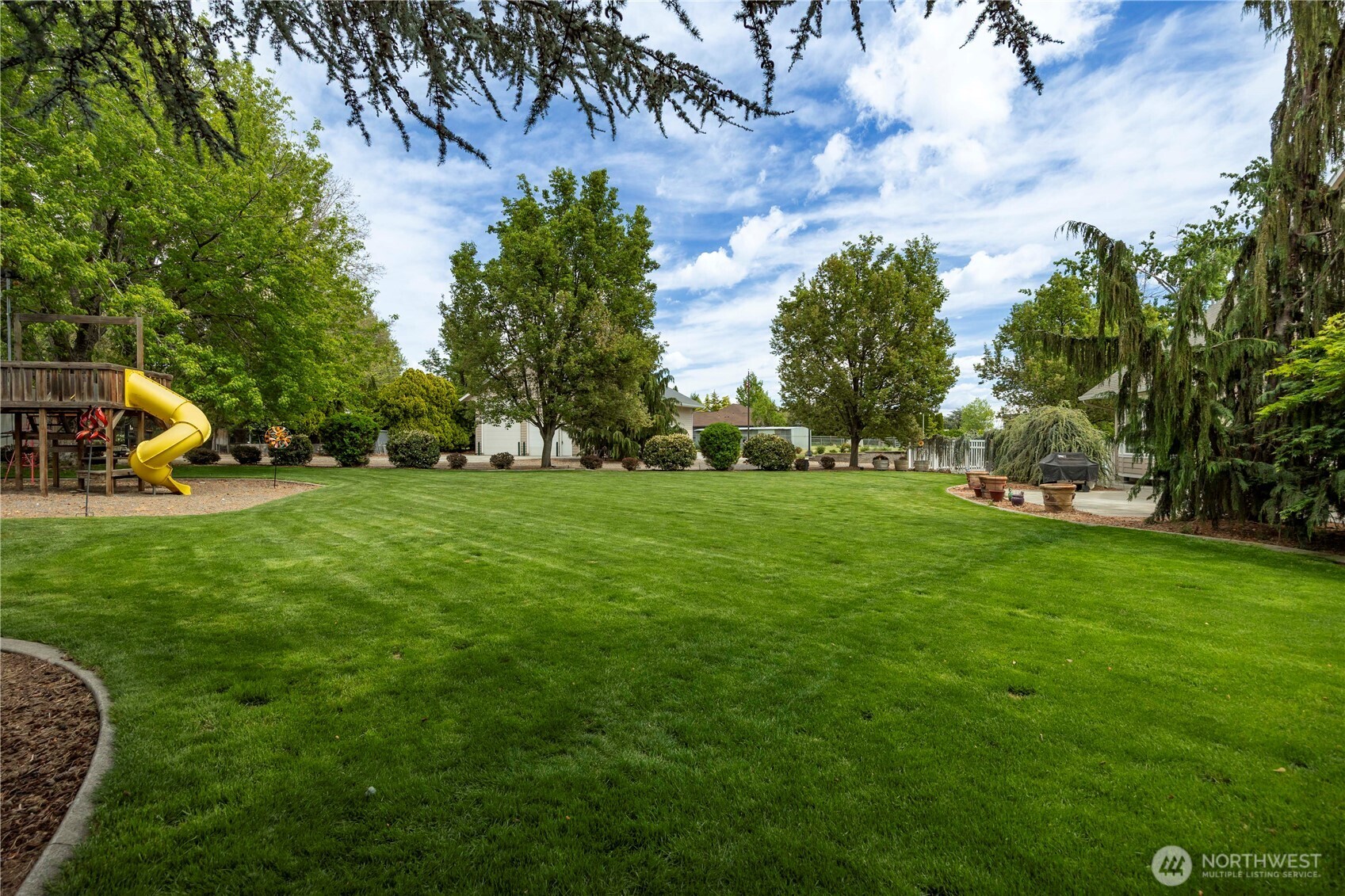 8620 Richardson Road Pasco, WA 99301 - Photo 36 of 40 a view of a park with large trees