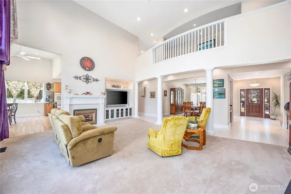 a living room with furniture and a table