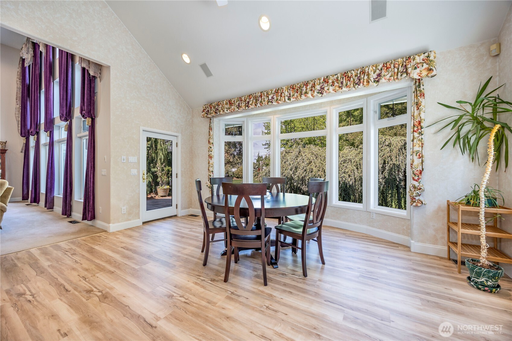 8620 Richardson Road Pasco, WA 99301 - Photo 10 of 40 a view of a dining room with furniture window and wooden floor
