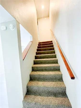 a view of a backyard of the house