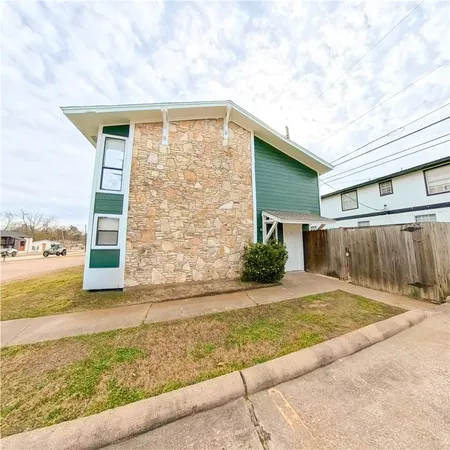 a view of a backyard of the house