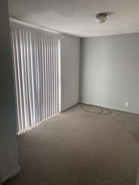 282 Commonwealth Avenue Springfield, MA 01108 - Photo 11 of 19 an empty room with a window