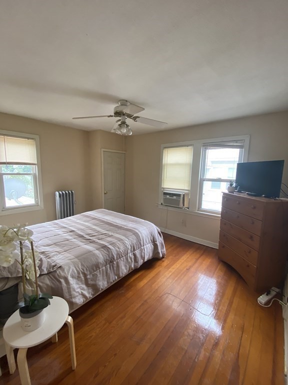 282 Commonwealth Avenue Springfield, MA 01108 - Photo 12 of 19 a bedroom with a bed and window
