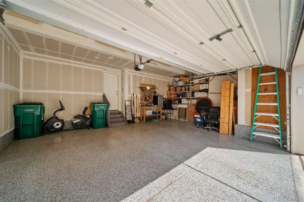 a view of a garage with furniture