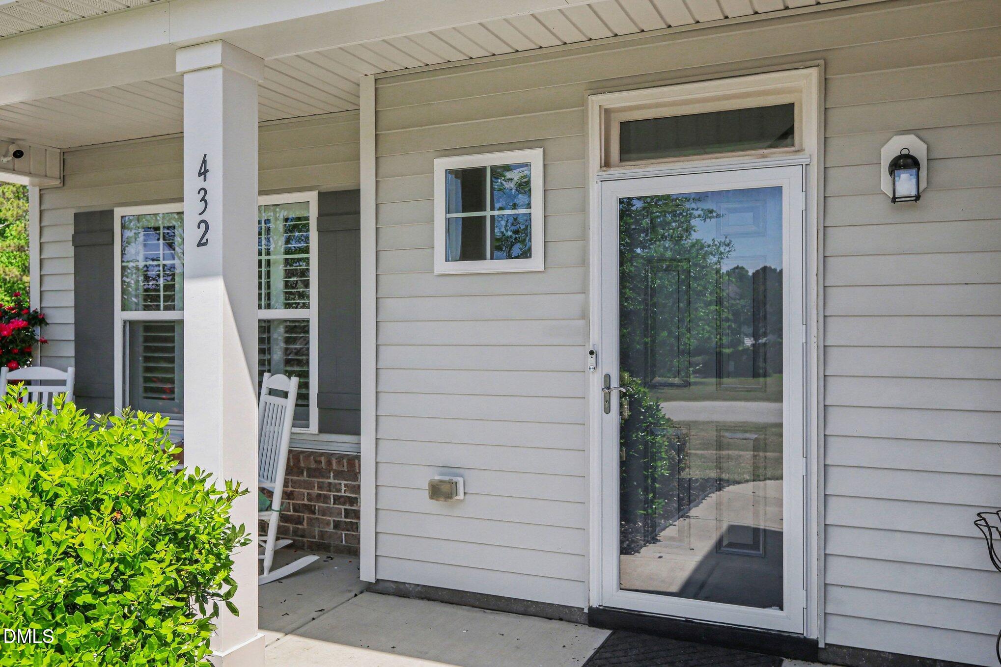 432 Seabring Lane Raleigh, NC 27603 - Photo 4 of 29 a view of front door and porch
