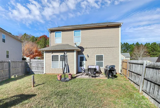 a view of a patio with furniture