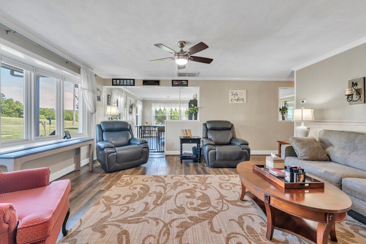 3226 Rakes Road Rocky Mount, VA 24151 - Photo 7 of 74 a living room with furniture and a large window