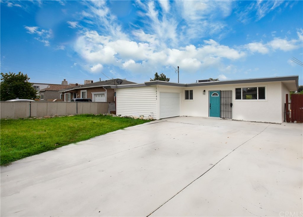 16743 Reed Street Fontana, CA 92336 - Photo 1 of 1 a view of an house with backyard and garden