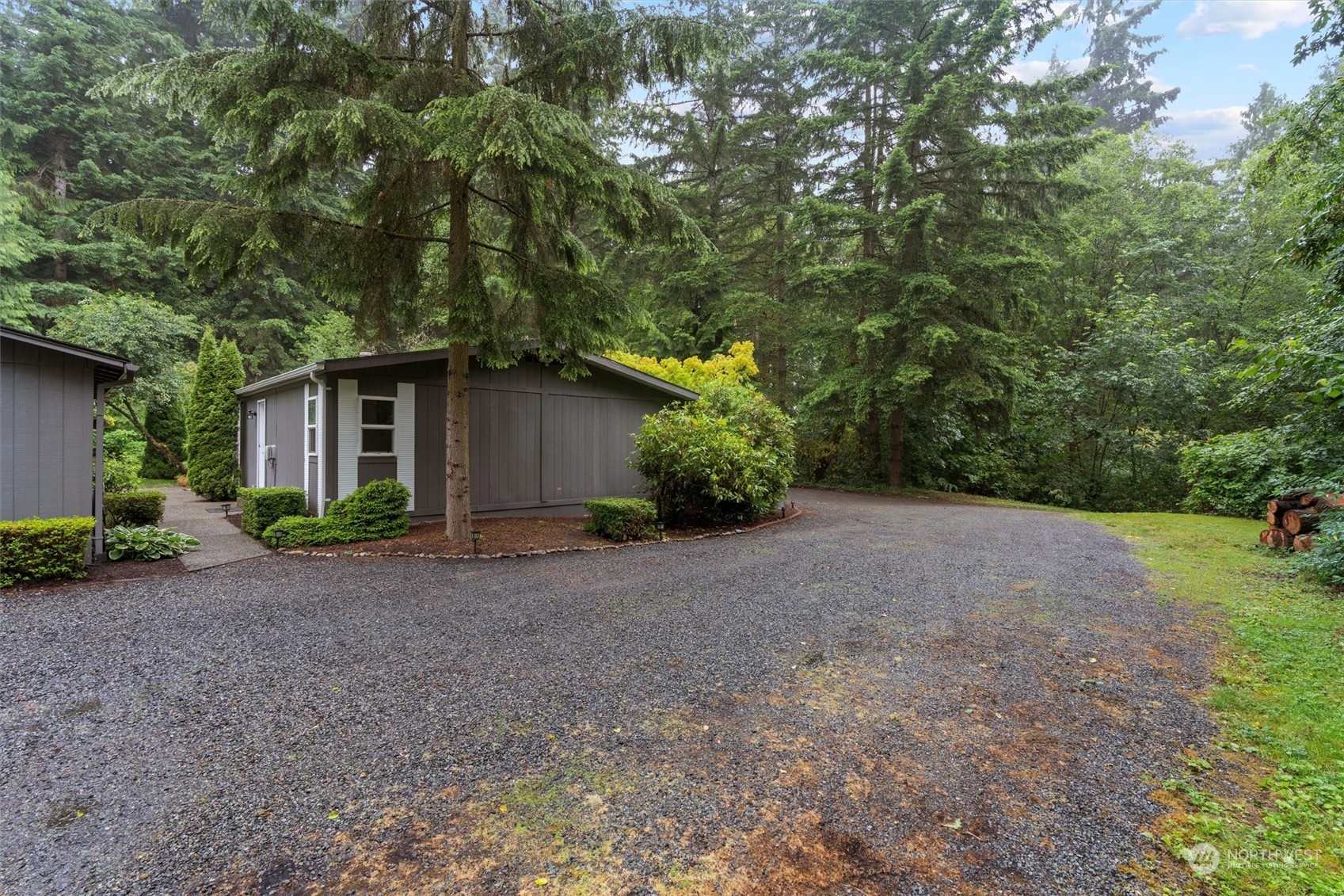 22514 53rd Avenue Southeast Bothell, WA 98021 - Photo 36 of 40 a view of a house with a tree in the background