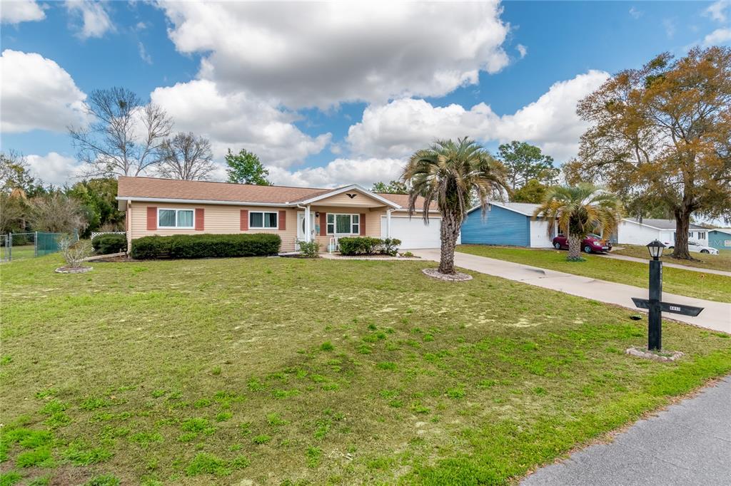 8417 Southwest 106th Street Ocala, FL 34481 - Photo 30 of 49 a front view of house with yard