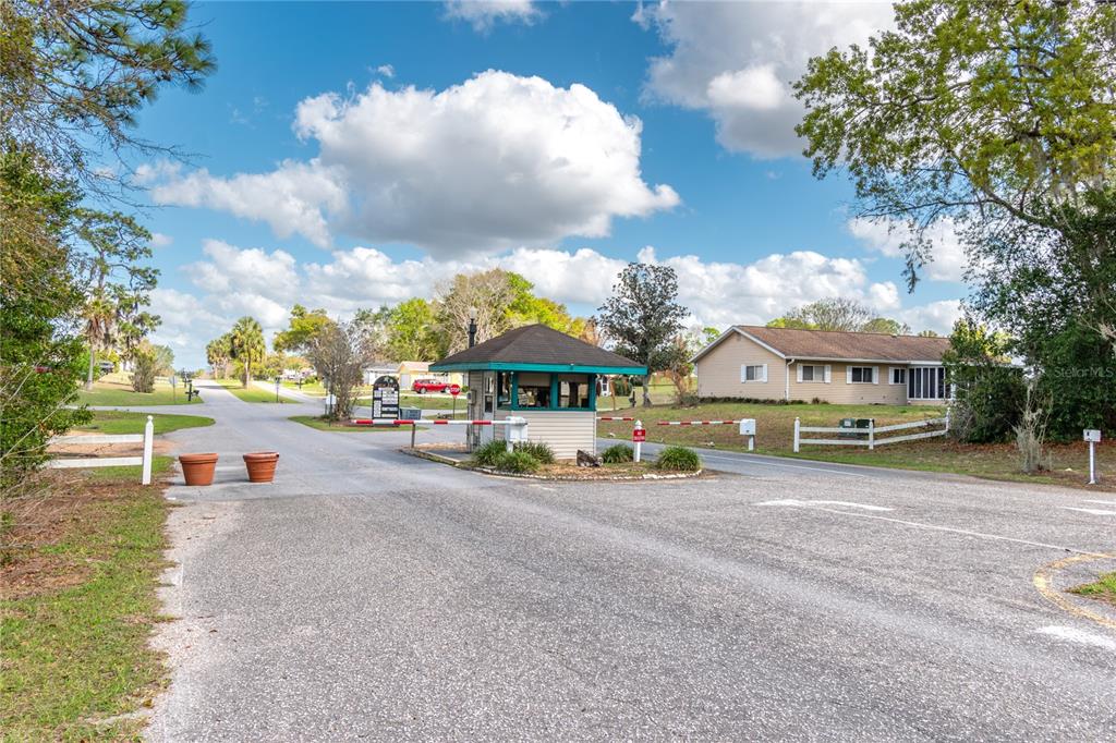 8417 Southwest 106th Street Ocala, FL 34481 - Photo 38 of 49 a view of a street with houses