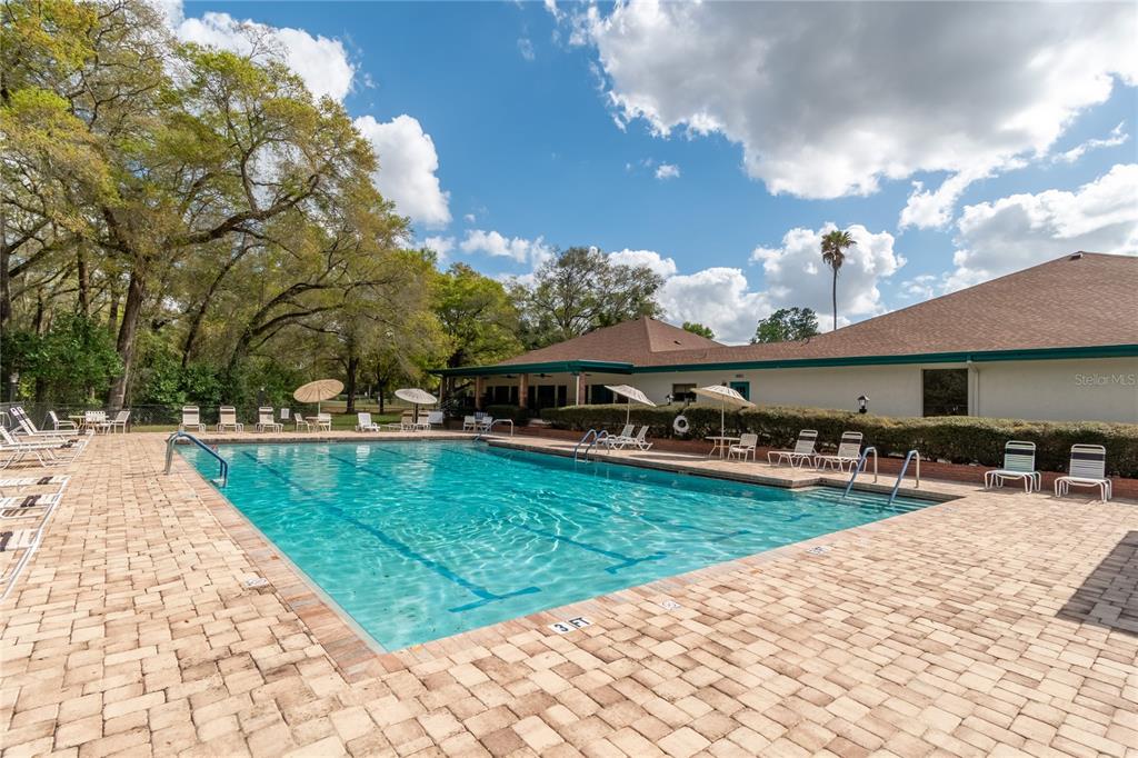 8417 Southwest 106th Street Ocala, FL 34481 - Photo 39 of 49 a view of a swimming pool with a patio