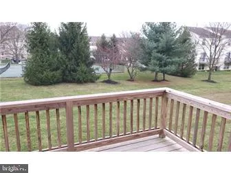 a black and white photo of a living room