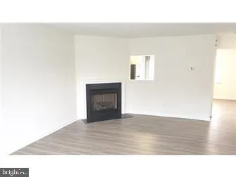 a black and white photo of a living room