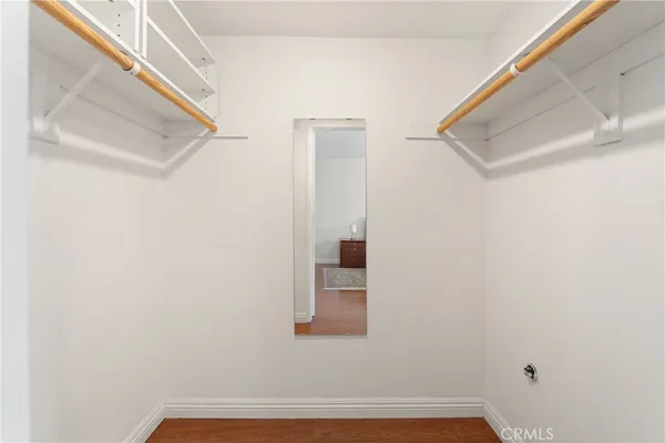 a bathroom with a shower and a glass door