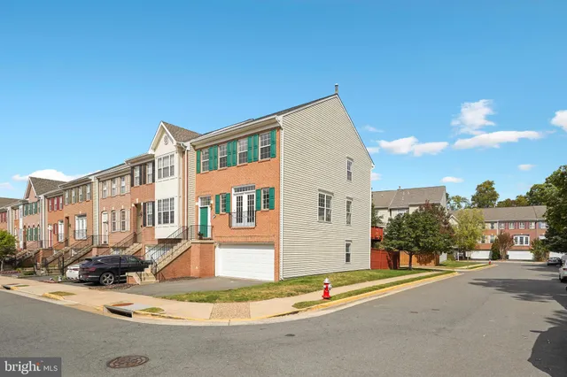 a view of a house with a street