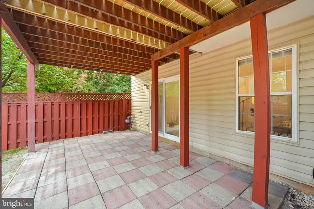 a view of porch with wooden floor