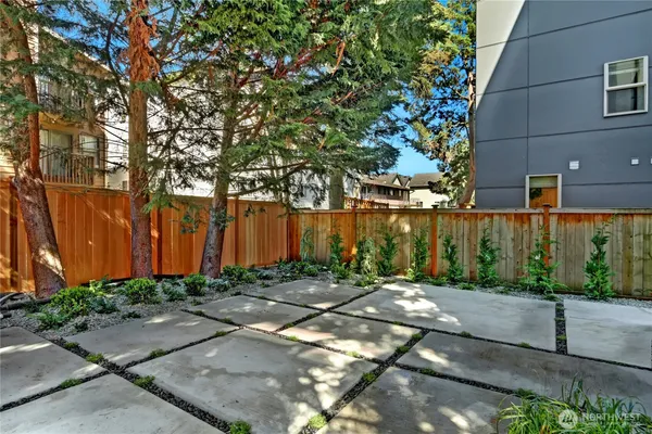 a backyard of a house with lots of green space