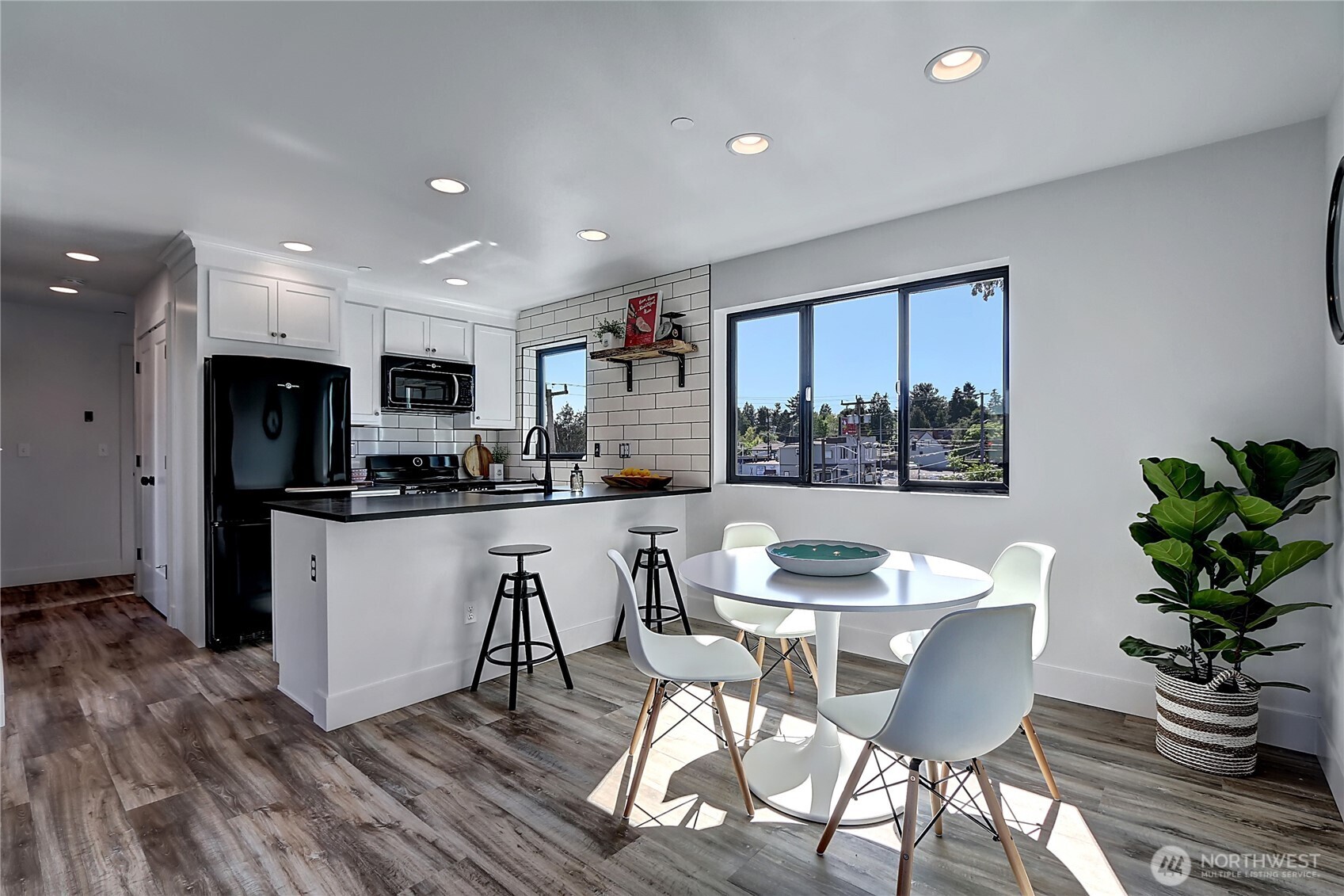 1126 North 90th Street Seattle, WA 98103 - Photo 6 of 15 a dining room with furniture and window