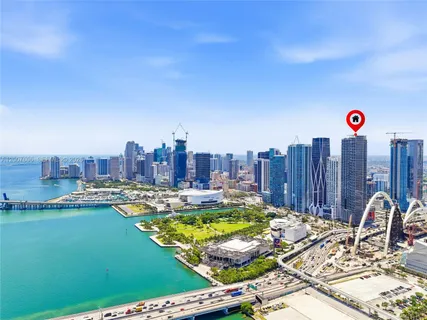 a view of city with tall buildings