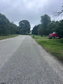 a view of a yard with entertaining space