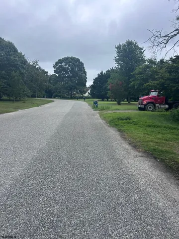a view of a yard with entertaining space