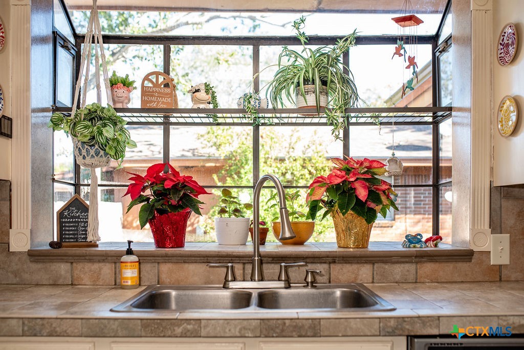 1315 Jackson Street Port Lavaca, TX 77979 - Photo 15 of 32 a view of a living room with a window and a table