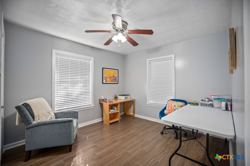 1315 Jackson Street Port Lavaca, TX 77979 - Photo 25 of 32 a view of a workspace with furniture and a window